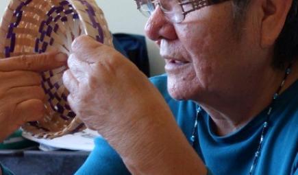 Elder describing traditional woven basket