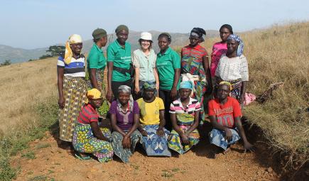 Female survey team members from local Nigerian community pose with researcher