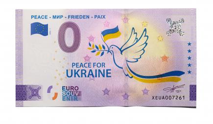 A zero euro banknote with a blue and yellow stylized dove and the phrase "Peace for Ukraine."