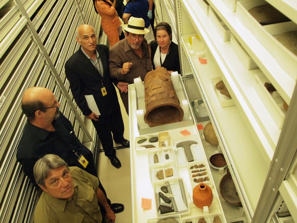 CILP organized its first interdisciplinary workshop in 2011. Here, (from left to right) Jose Barreiro, Osvaldo Garcia-Goyco, Juan Manuel Delgado Colón, Alejandro Hartmann, and Emily Skeels visit NMAI collections. Photo Credit: Smithsonian Institution.