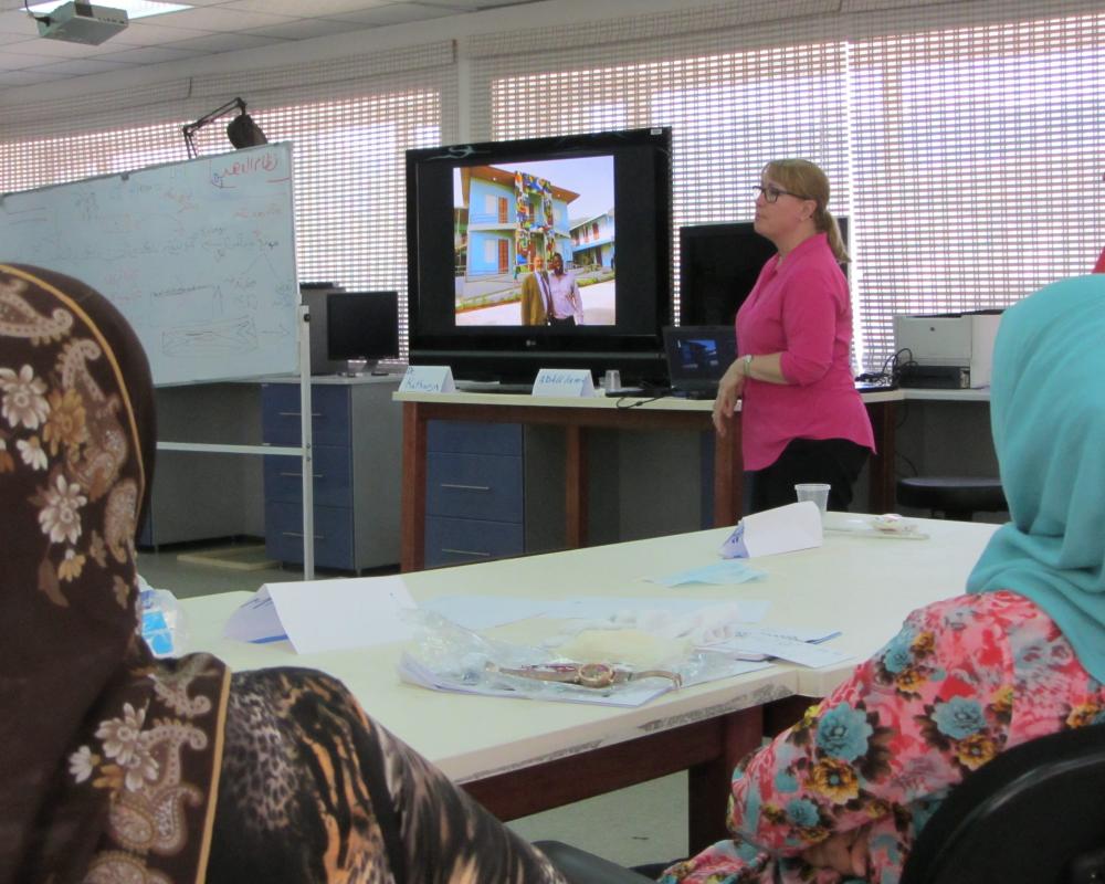 Cori Wegener talks to Iraqi heritage professionals. 