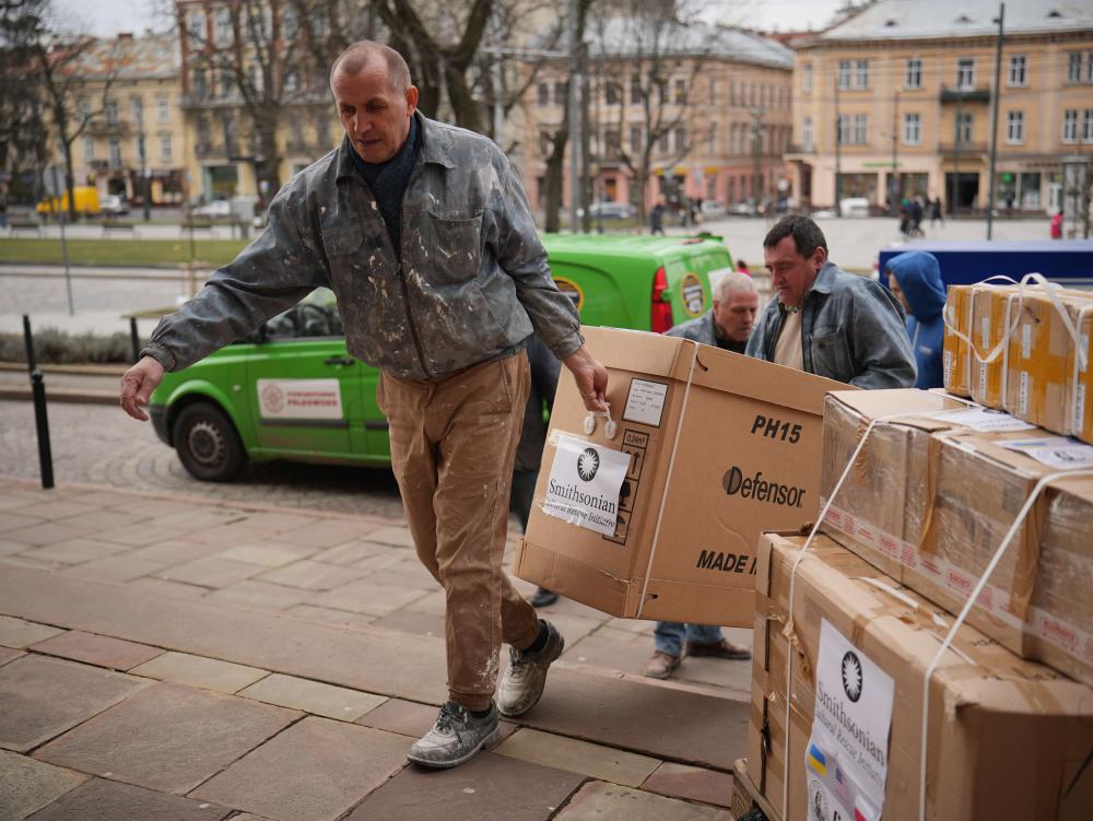 Workers load up an equipment shipment to a Ukrainian museum in partnership with the Kosciuszko Foundation.