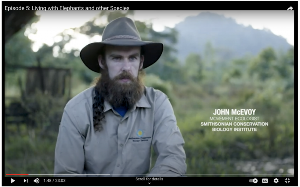 A man with a hat and beard.